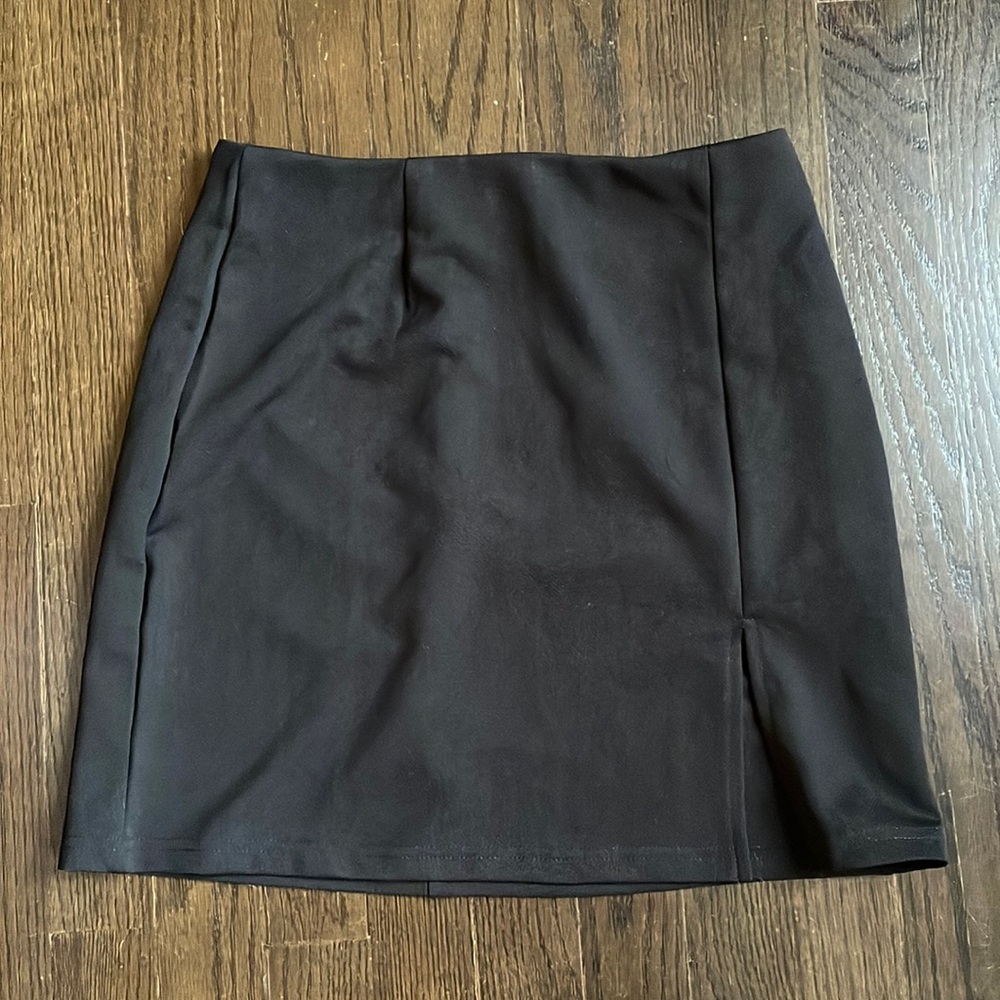 Black stretch mini skirt with front slit